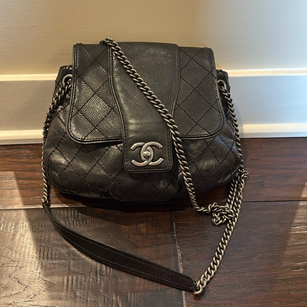 Black Chanel bag. Can be shoulder or crossbody with gunmetal hardware